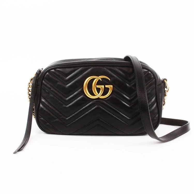 Women Gucci bags with a zippered interior pocketGucci  GG Marmont Black Leather Flap Bag Medium Size