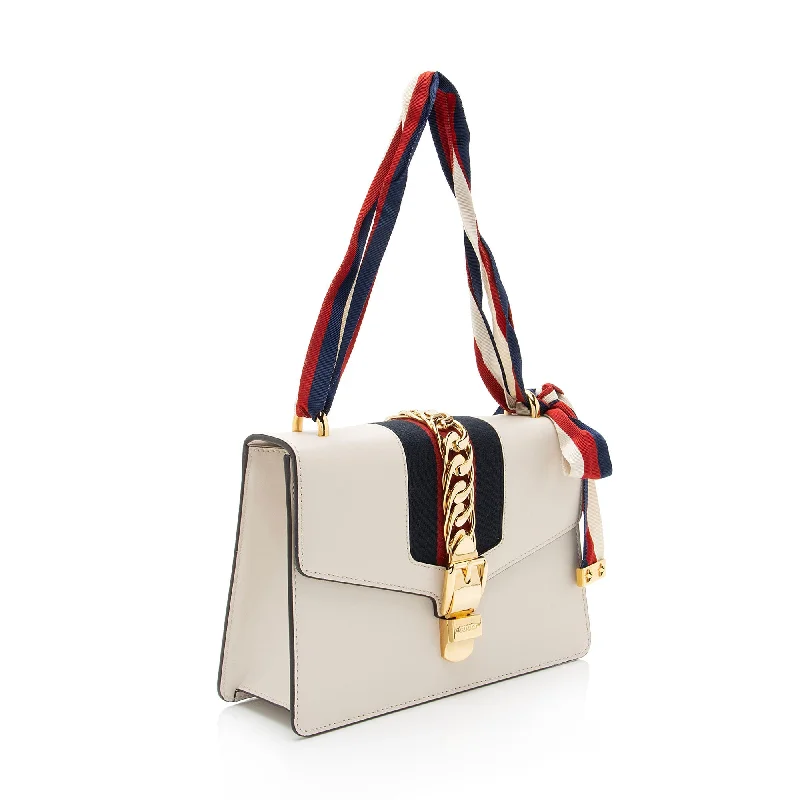 Ladies Gucci shoulder bags with a tassel decorationGucci Calfskin Sylvie Small Shoulder Bag (G6Ob0L)