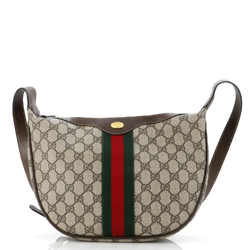 Ladies Gucci Dionysus bags with a star - shaped charmOphidia Half Moon Hobo GG Coated Canvas Small