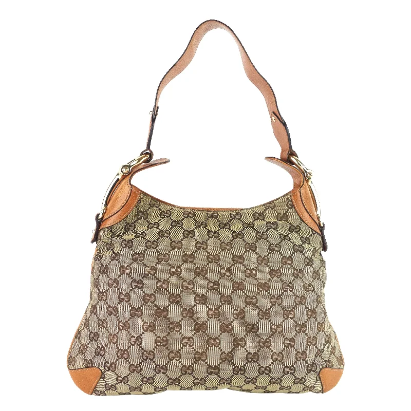 Ladies Gucci shoulder bags with a wide - width strapInterlocking GG Medium Canvas Bag