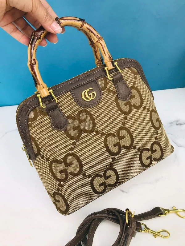 Ladies Gucci shoulder bags with a magnetic - closure flapGucci bamboo handle handbag