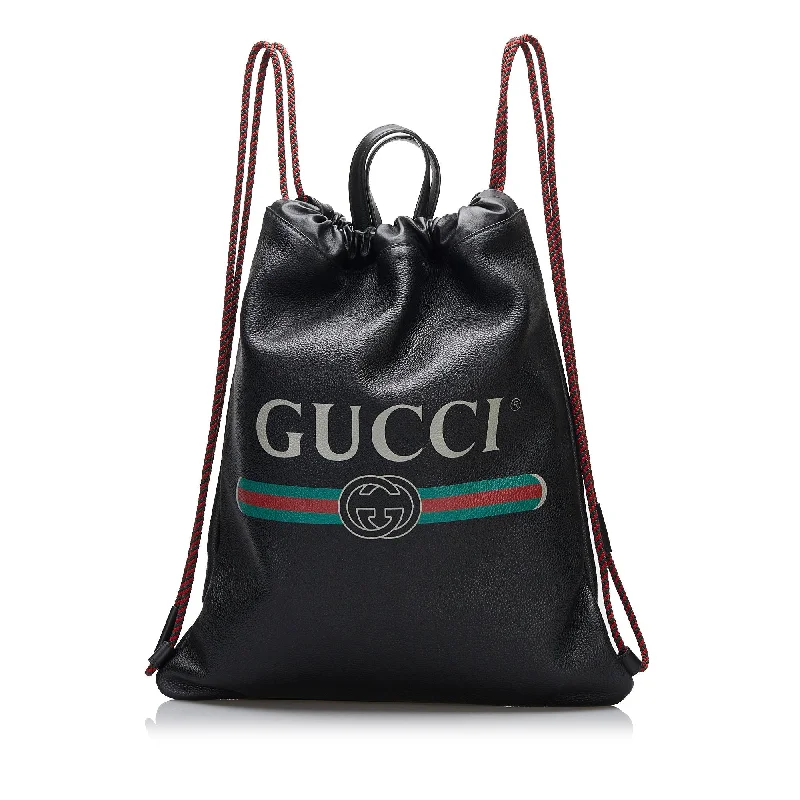 Women Gucci bags with a snap - button closure and a decorative charmGucci Logo Drawstring Backpack Black