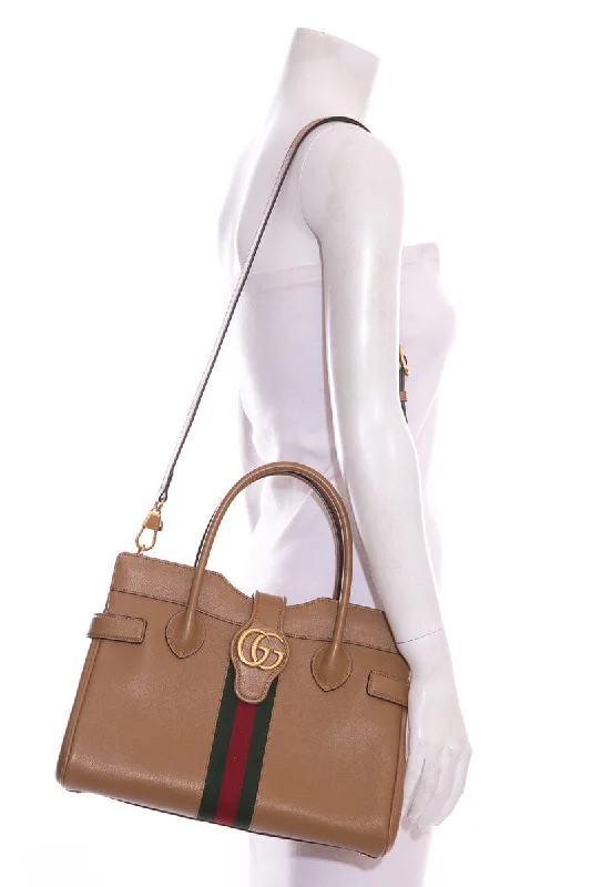 Women Gucci Sylvie bags featuring the signature web stripeGucci Dalhia W/ GG Logo Handbag