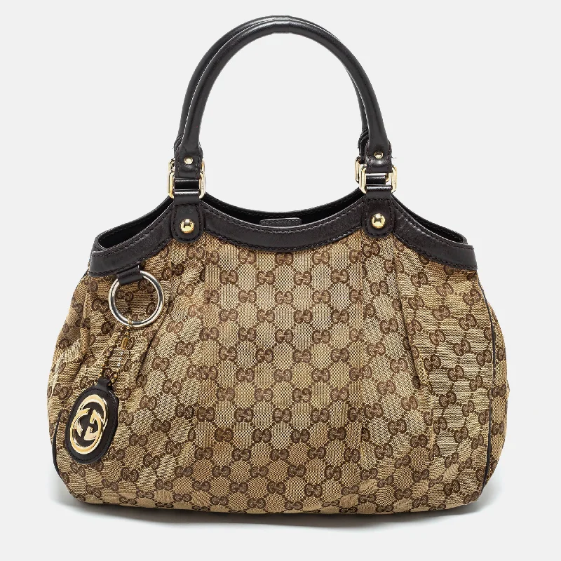 Women Gucci Sylvie bags with a detachable ribbon detailGucci Beige GG Canvas and Leather Medium Sukey Tote