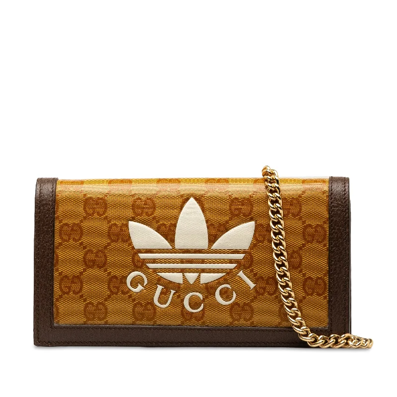 Women Gucci crossbody bags with a woven leather strapBrown Gucci x Adidas GG Supreme Wallet on Chain Crossbody Bag