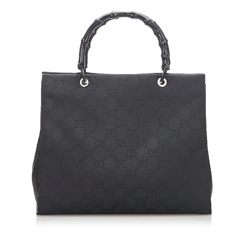 Women Gucci bags with interlocking G hardware for a classic lookGucci Bamboo GG Nylon Tote (SHG-18233)