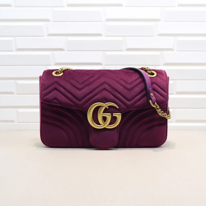 Gucci Marmont bags for women with a contrast - colored interiorGucci Bags