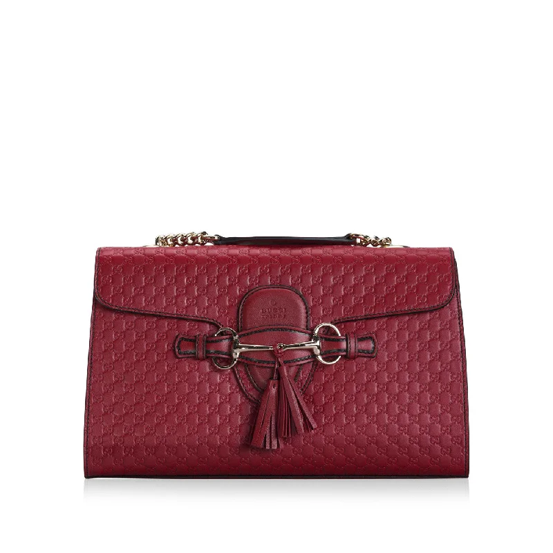 Women Gucci Sylvie bags with a crystal - embellished web stripeEmily Guccissima