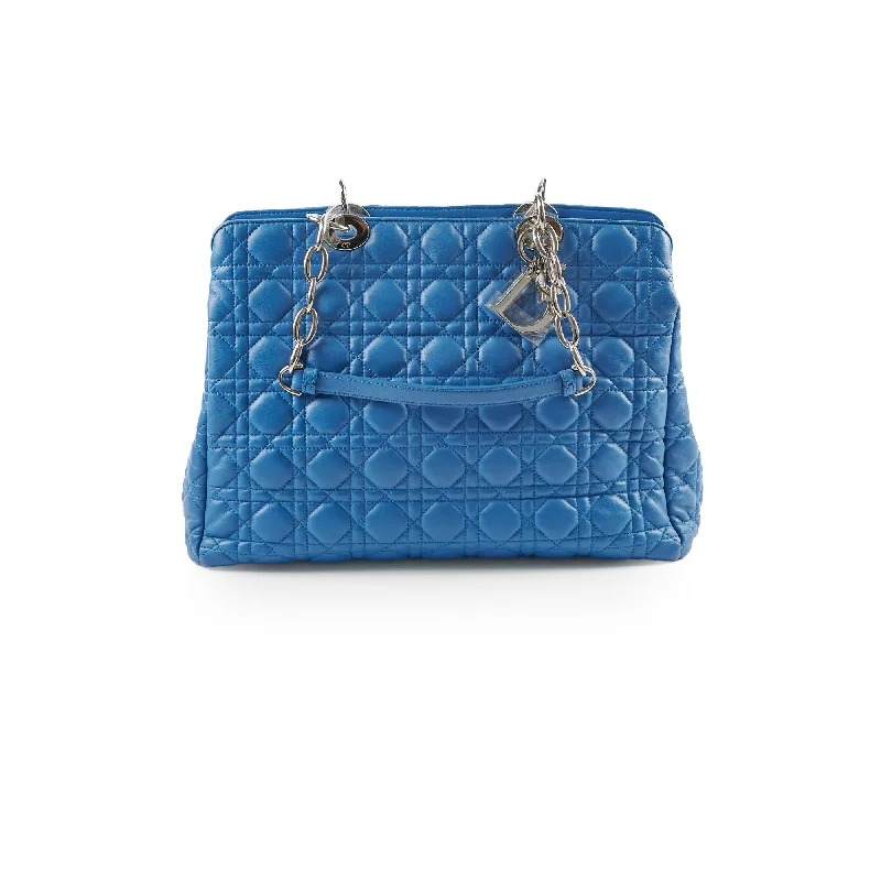 Contemporary Christian Dior handbags with a unique shapeChristian Dior Cannage Leather Shopping Tote Blue