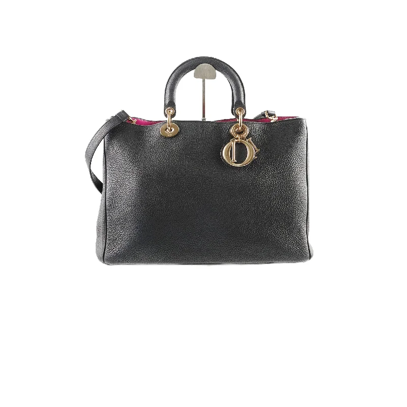 Contemporary Christian Dior handbags with a unique shapeChristian Dior Diorissimo Medium Black