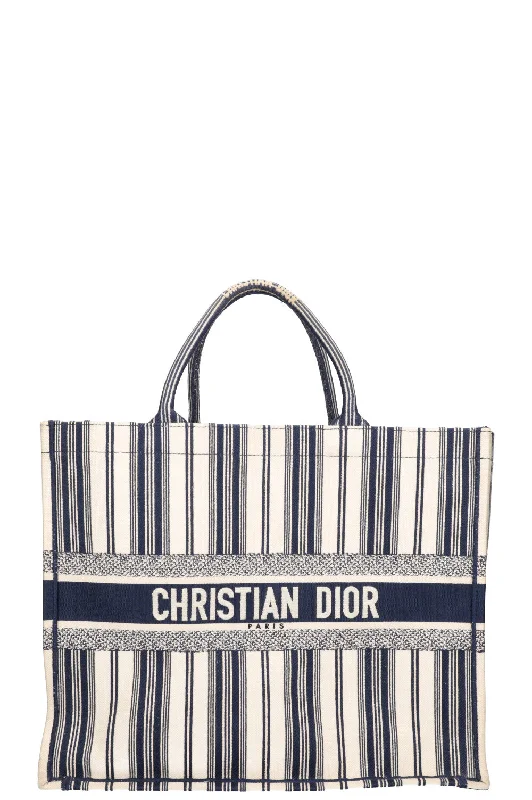 Christian Dior tote bags with a printed Dior logo on the frontCHRISTIAN DIOR Book Tote Capri