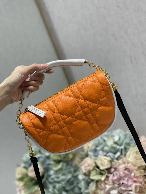 Trendsetting Christian Dior crossbody bags with a colorful strapChristian Dior Small Vibe Hobo Bag Fluorescent Orange Macrocannage