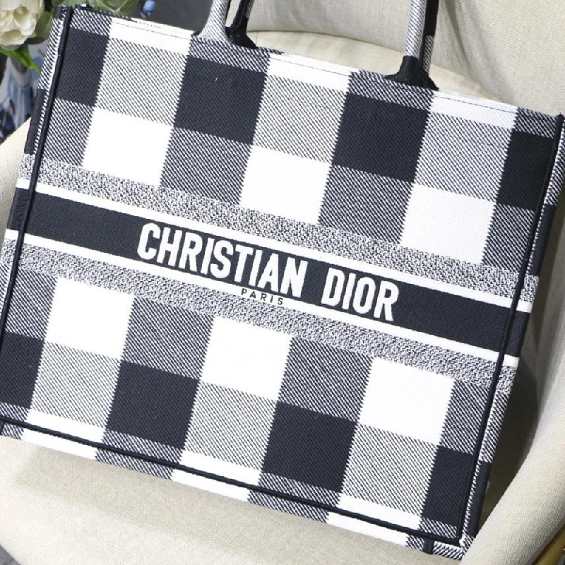 Christian Dior backpacks with a sleek, minimalist silhouetteDIOR BOOK TOTE