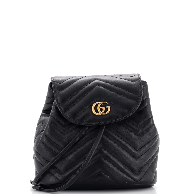 Women Gucci Sylvie bags featuring the signature web stripeGG Marmont Drawstring Backpack Matelasse Leather Mini